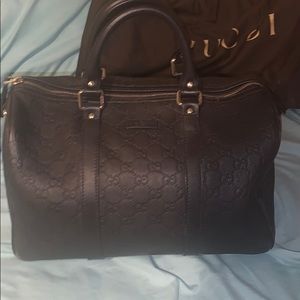 Dark brown Gucci purse with dust bag